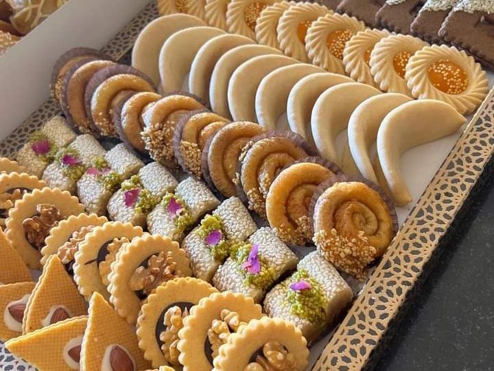 Tray of Moroccan cookies and pastries with almonds, sesame and walnuts