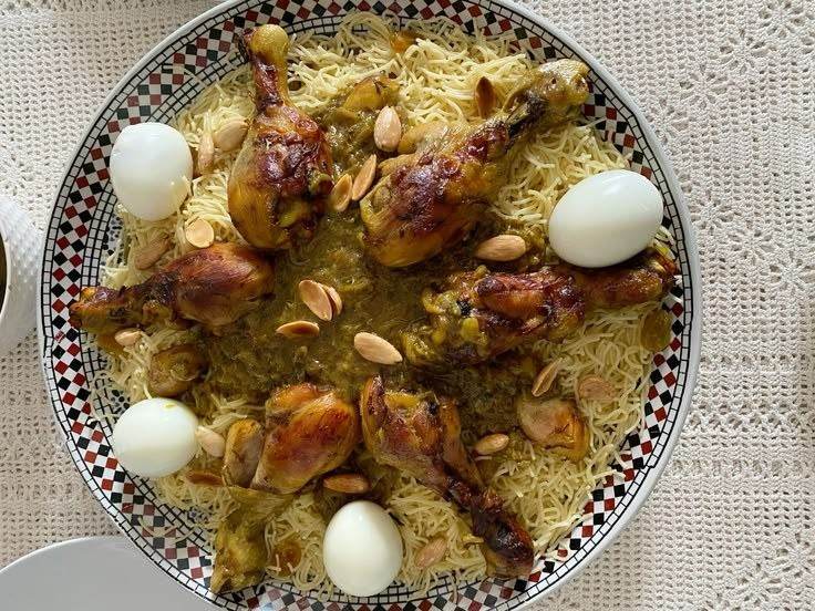 Moroccan saffa with vermicelli, chicken, almonds and boiled eggs