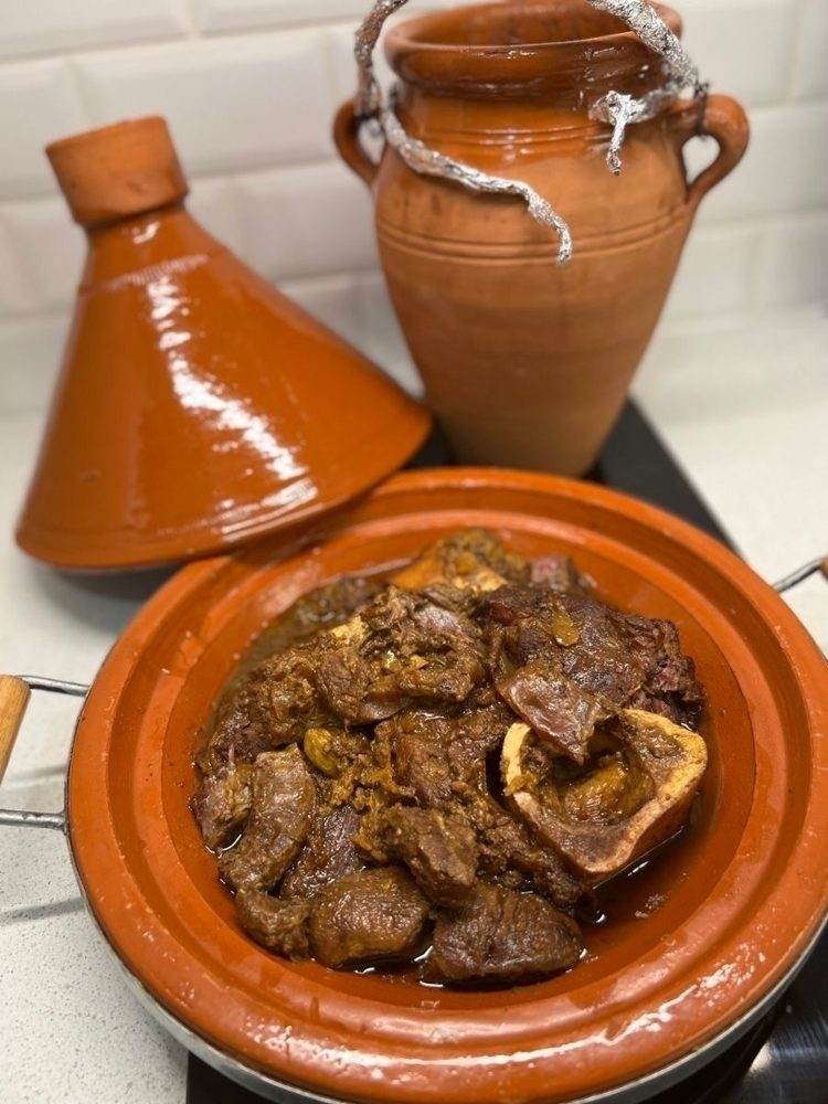 Tangia, a slow-cooked meat dish from Marrakech, served in a clay pot